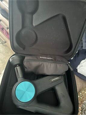 THERAGUN Elite Percussive Massage Device - Black with Teal Accent